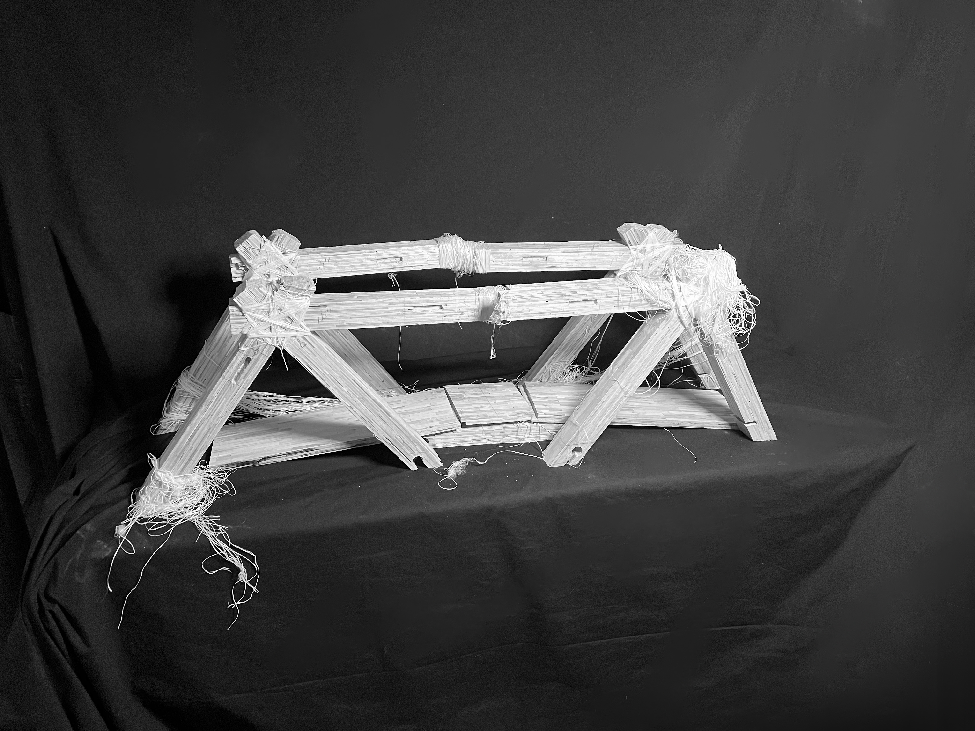 Troitsky Bridge structural prototype against black fabric
