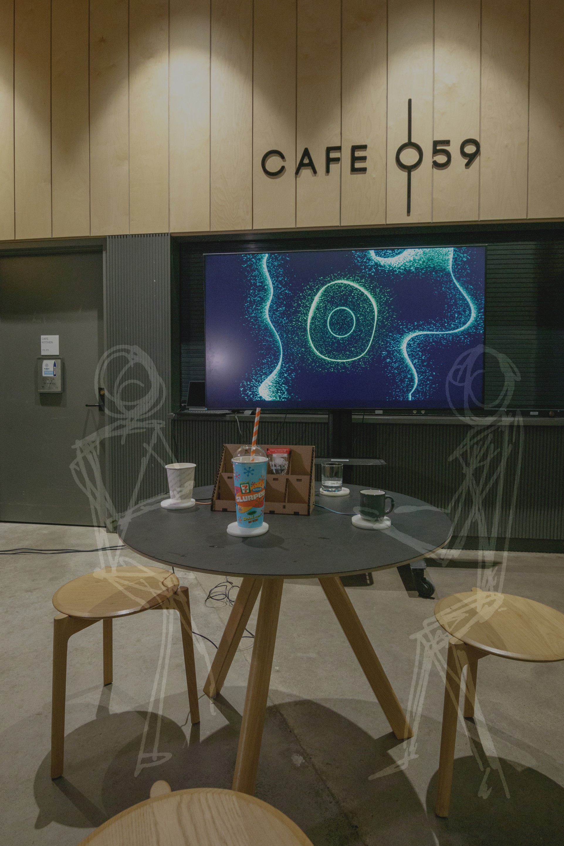 The final interactive table and projection installed in Café 059