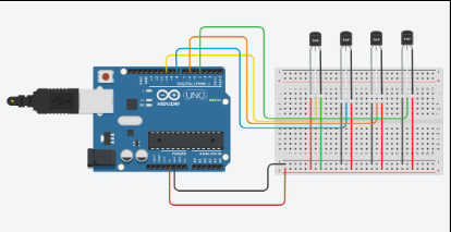 Arduino Uno wired to four temperature sensors on a breadboard